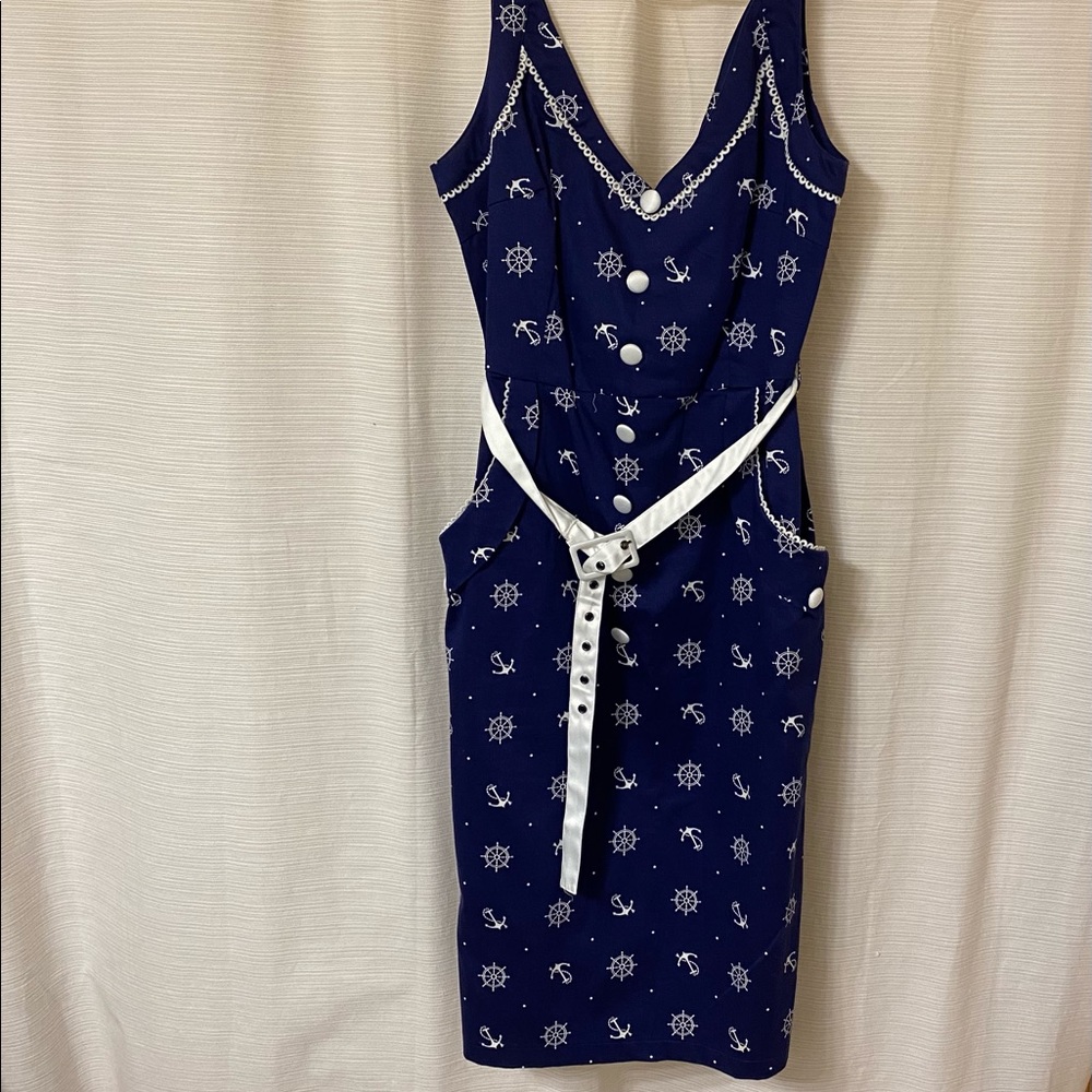 Nautical themed dress with pockets and belt. Navy Blue and white.